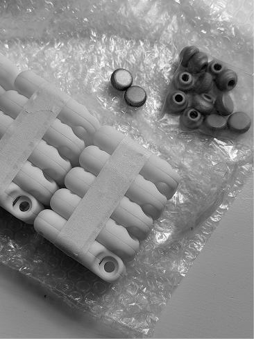 Prototype parts wrapped for assembly
